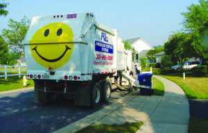 ADS truck picking up residential trash